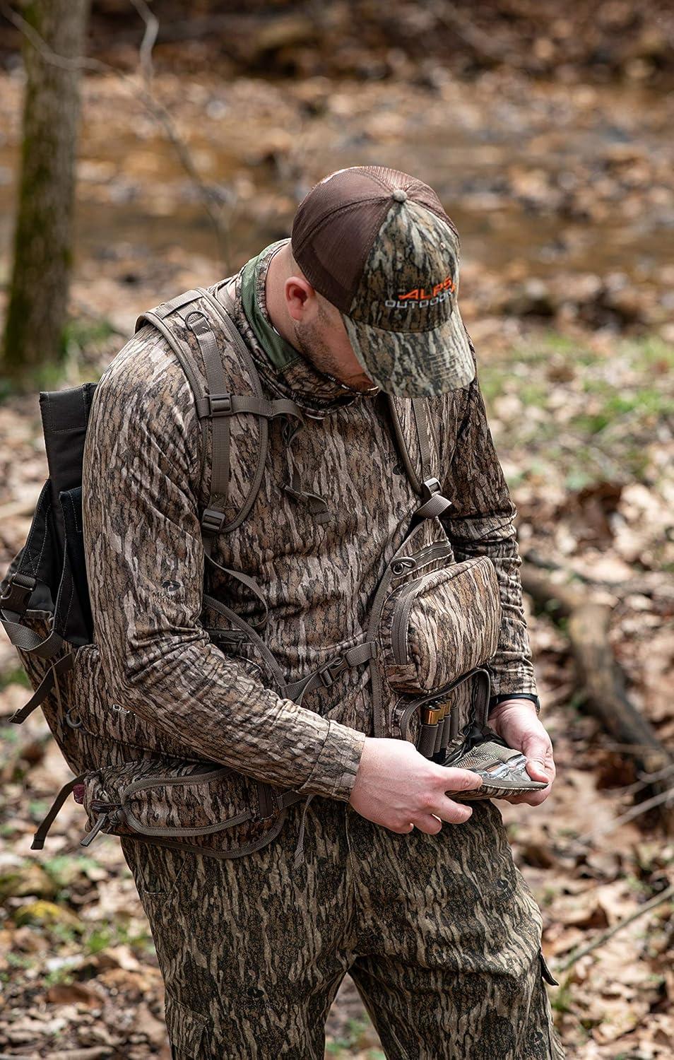 imageALPS OutdoorZ Impact Camo Turkey Vest with Removable Flip Down Seat Game Bag and Plenty of Pockets for Calls and StrikersMossy Oak Bottomland