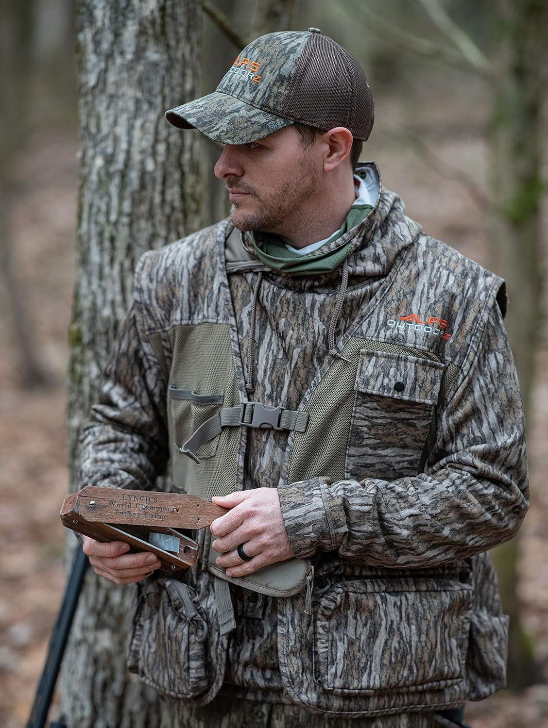 imageALPS OutdoorZ Super Elite 40 Camo Turkey Vest Featuring Removable Fold Away Seat Game Bag and Call and Striker PocketsMossy Oak Bottomland