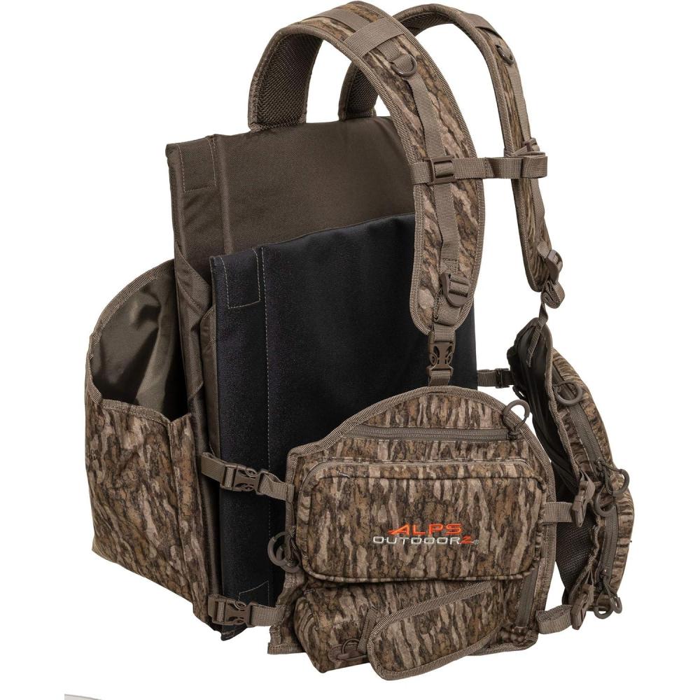 imageALPS OutdoorZ Impact Camo Turkey Vest with Removable Flip Down Seat Game Bag and Plenty of Pockets for Calls and StrikersMossy Oak Bottomland